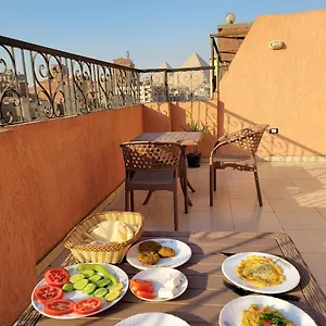 Pyramids Road Cozy And Rooftop Breakfast With The Pyramids View Nazlet el-Sisi