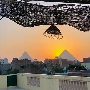 Nefertiti View Pyramids